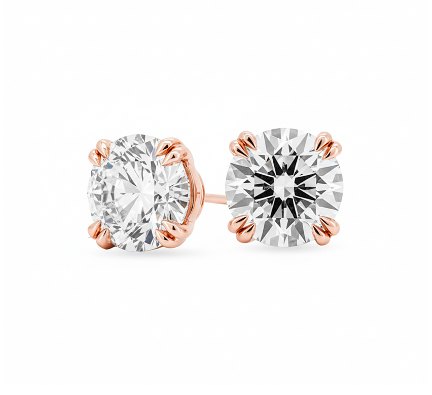 Double claw solitaire earrings RD 0.51 D VS1 IGI in rose gold
