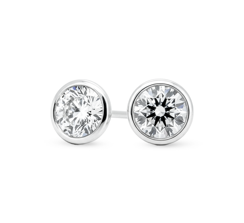 Solitaire bezel earrings RD 0.55 D VS1 IGI in white gold