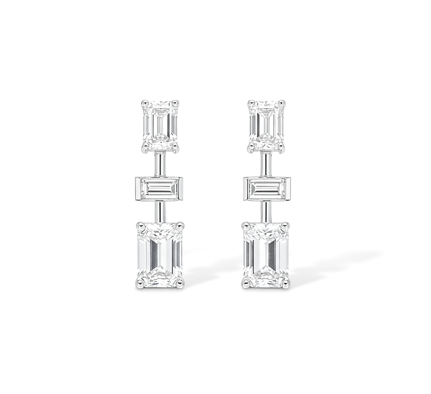 3 emerald drop earrings in white gold