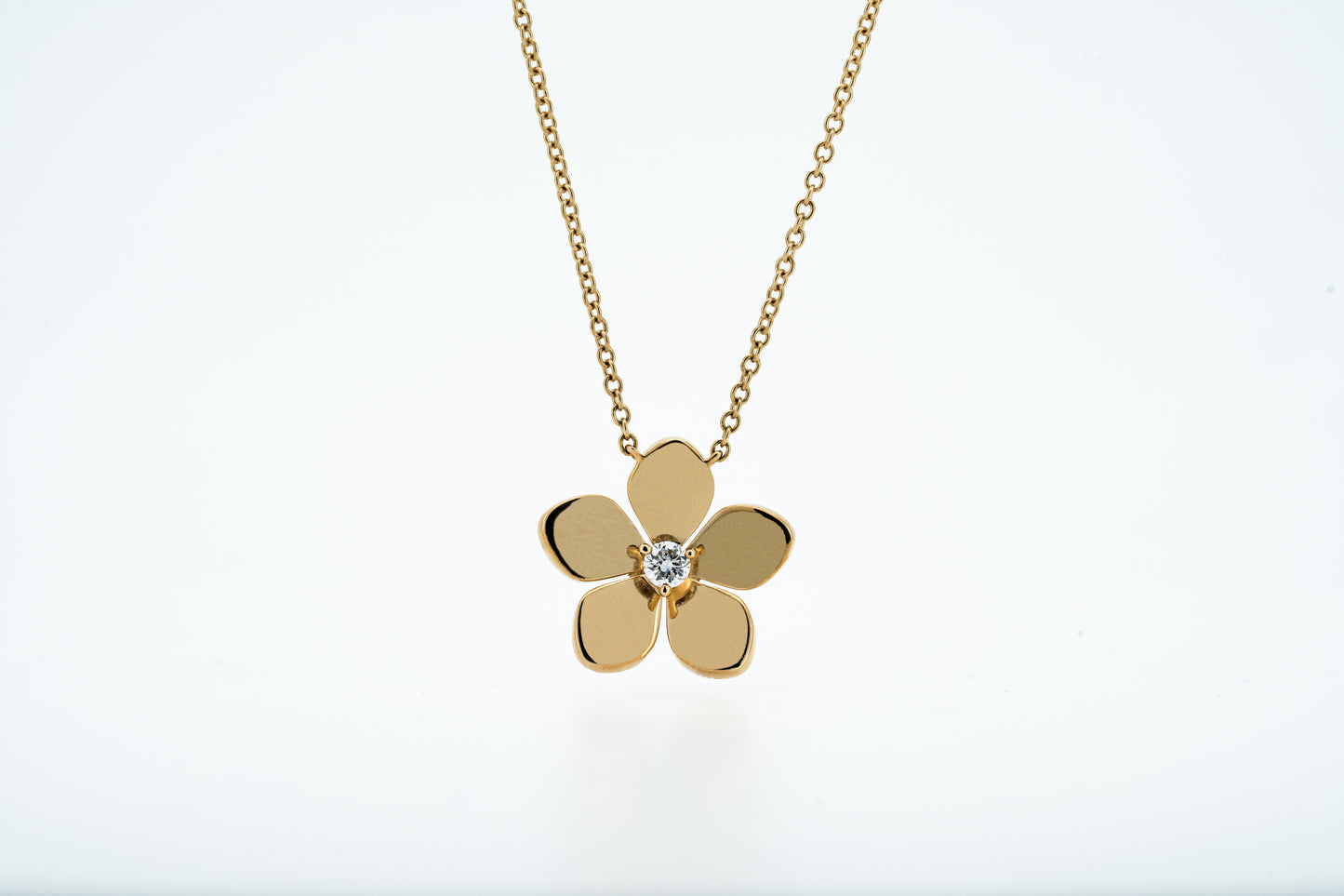 Plumeria flower necklace in gold