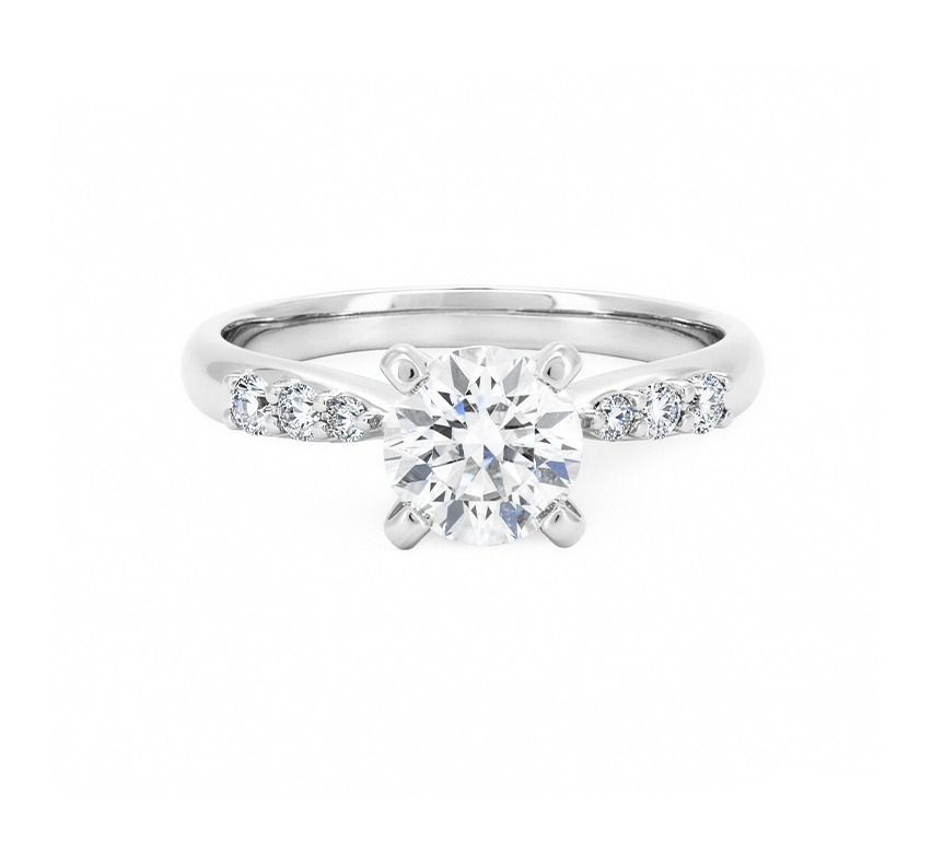Bow half pave 4 prong ring RD 1.58 D VVS2 IGI in white gold