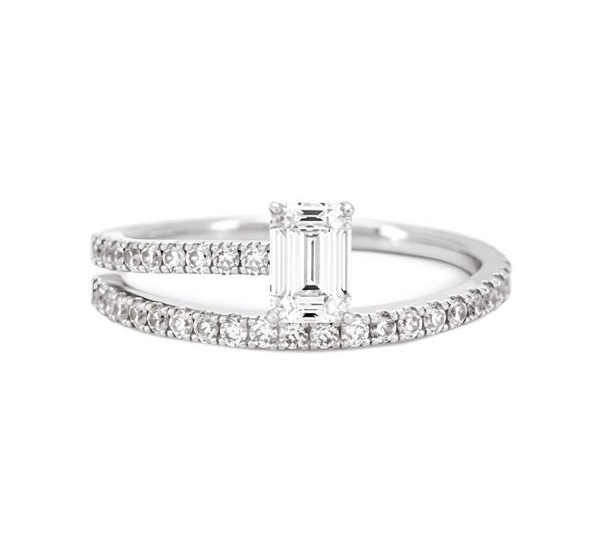 Spiral pave ring with emerald in white gold