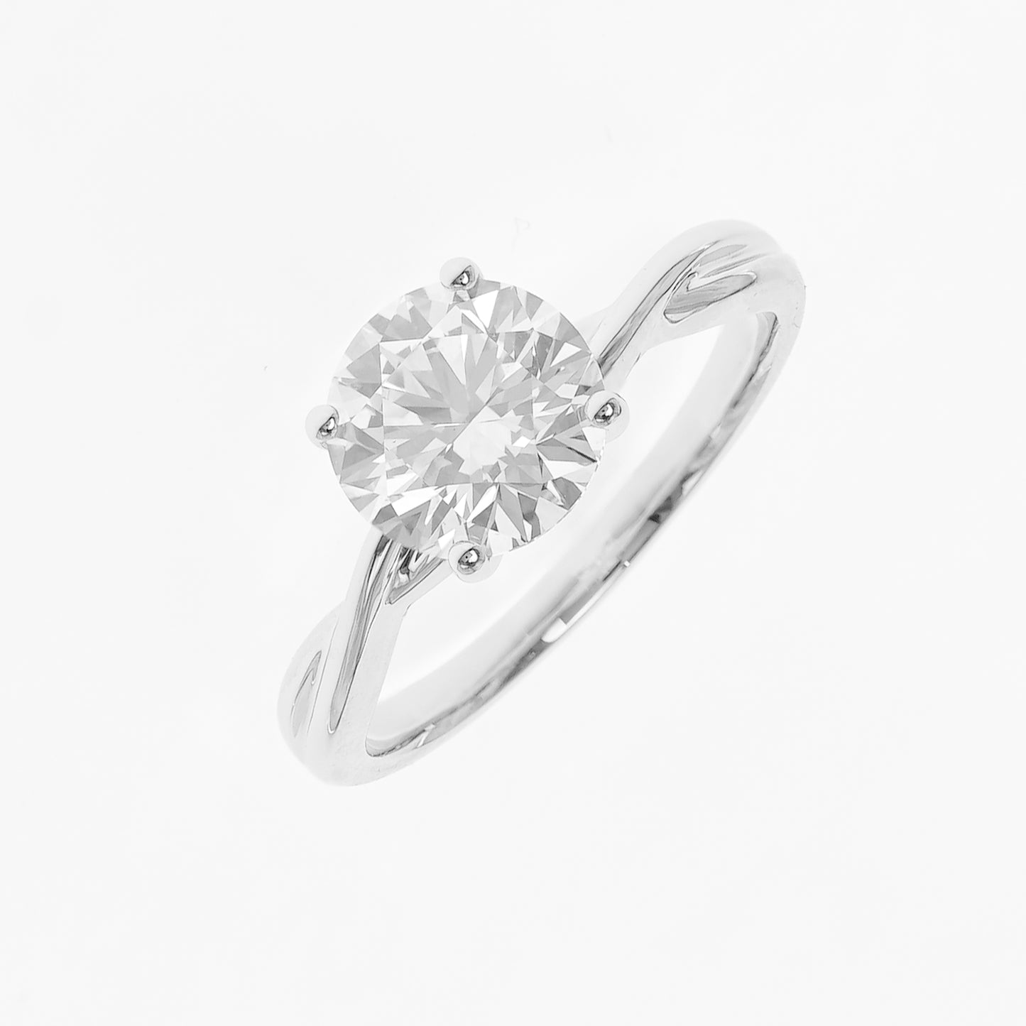 Vine plain twist ring RD 1.5 D VVS1 IGI in white gold