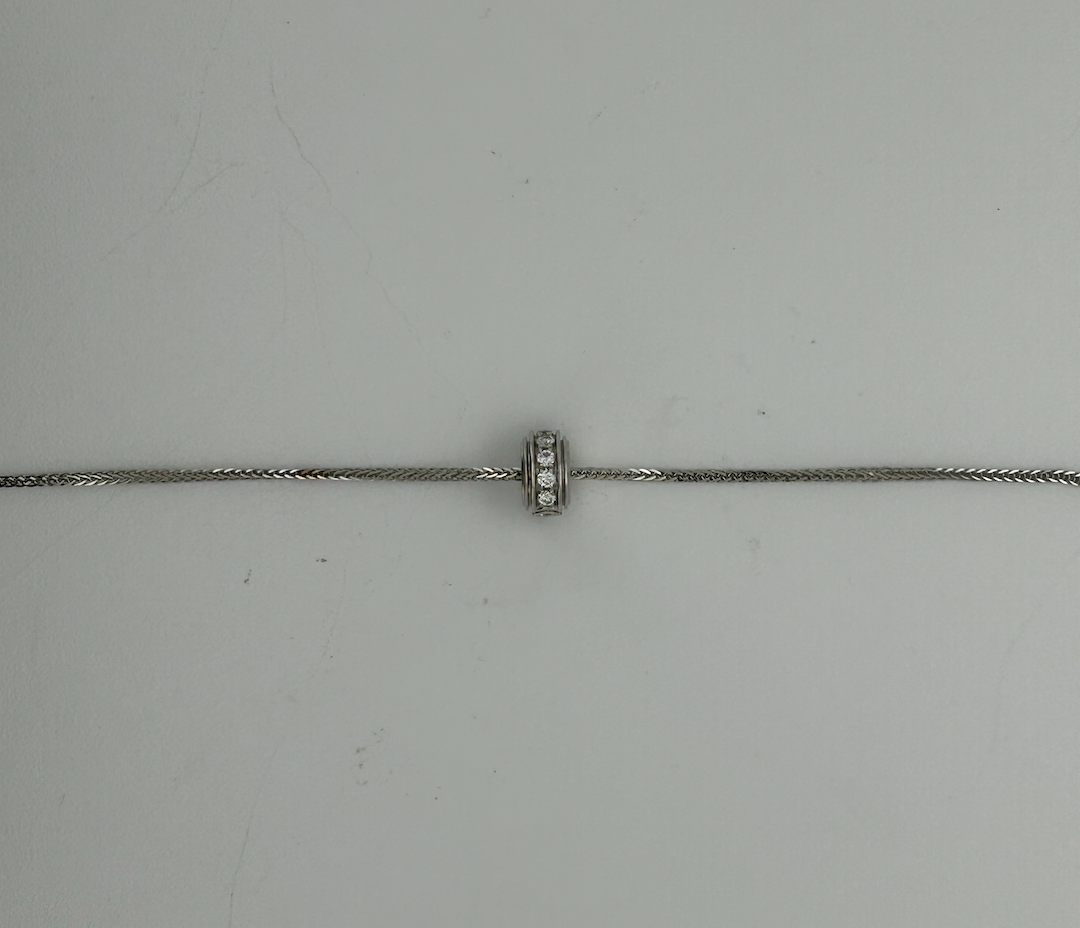 Barrel pave in white gold
