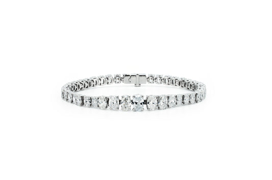 Graduating oval tennis bracelet in white gold