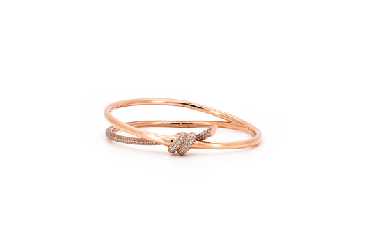 Double knot pave bangle in rose gold