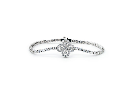 Fancy flower tennis bracelet in white gold