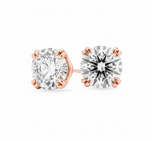 Double claw solitaire earrings RD 0.51 D VS1 IGI in rose gold