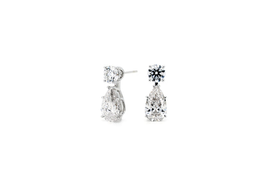 Tear drop earrings RD 0.86 and PE 2.35 IGI in white gold