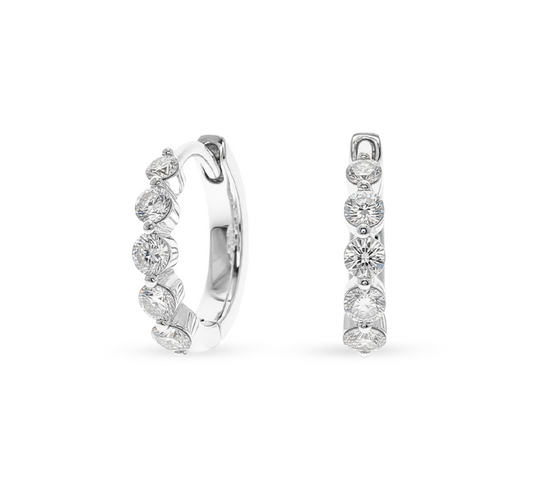 Floating pave hoop earrings in white gold