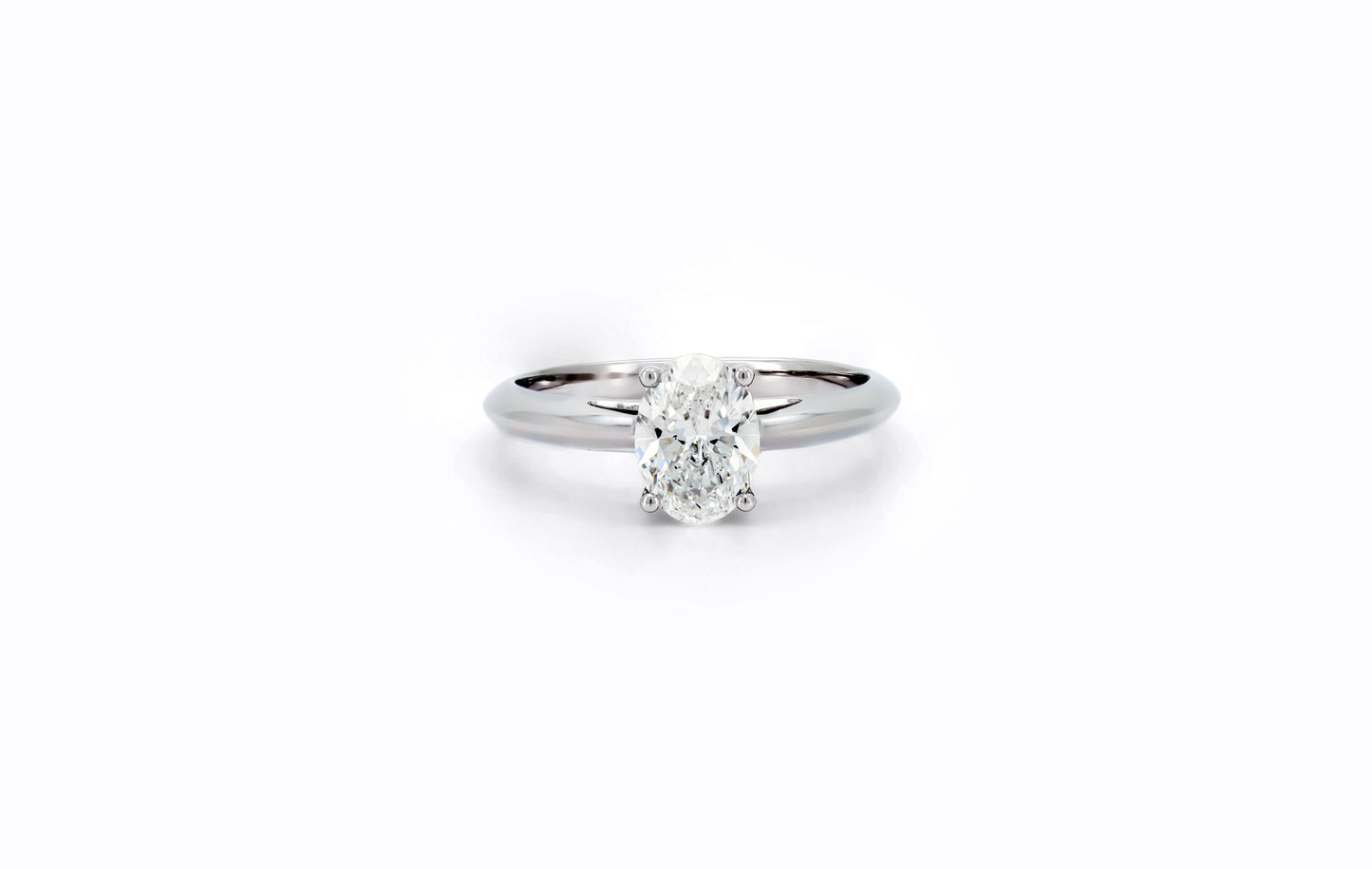 Classic 4 prong ring OV 1 D VVS2 IGI in white gold