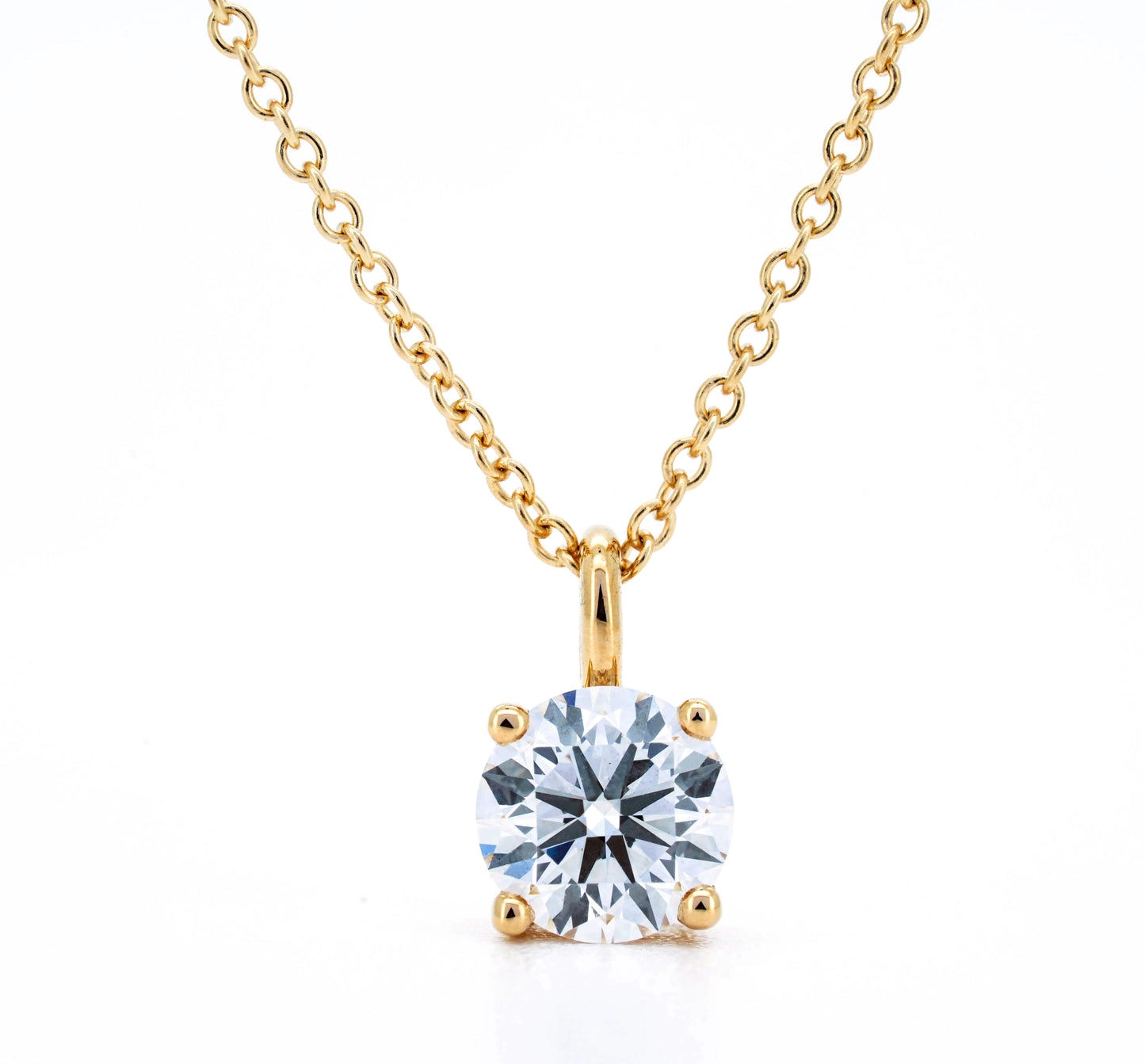 Hanging solitaire necklace RD 0.73 D VS1 IGI in gold