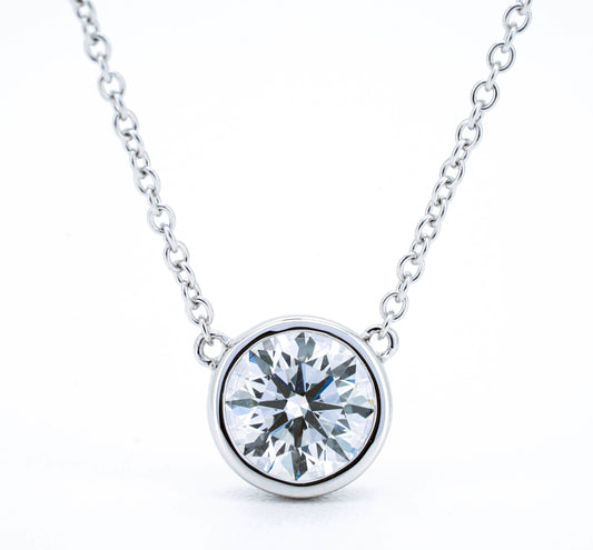 Slider bezel solitaire necklace RD 0.78 D VS1 IGI in white gold