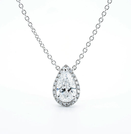 Halo solitaire necklace PE 0.63 D VVS2 IGI in white gold