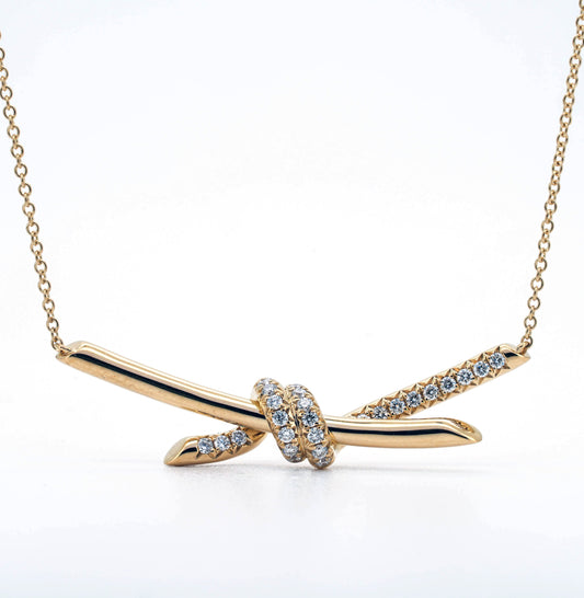 Knot pave necklace in gold