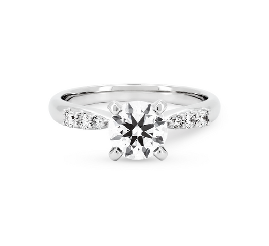 Bow half pave 4 prong ring RD 0.53 D VVS2 IGI in white gold