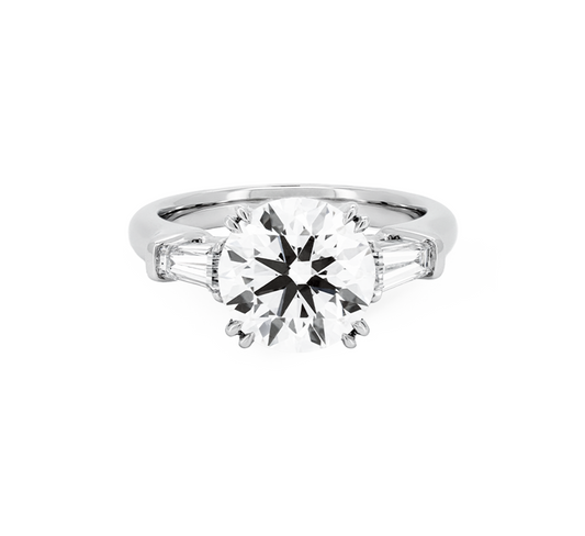 3 stone baguette ring RD 0.87 E VS2 IGI in white gold