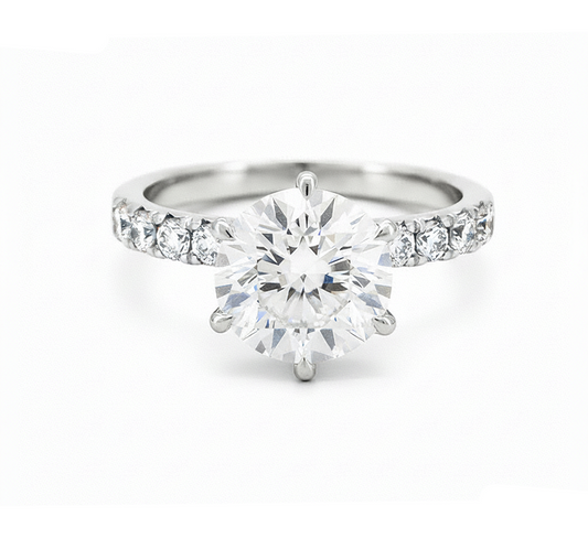 Half pave 6 prong ring RD 0.7 D VVS2 IGI in white gold
