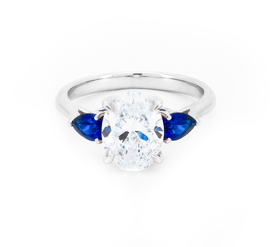 Trilogy Oval with Sapphire Ring OV 1.5 D VVS2 IGI in white gold
