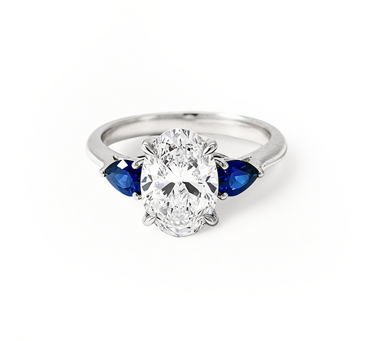 Trilogy Oval with Sapphire Ring OV 1.6 D VS1 IGI in white gold
